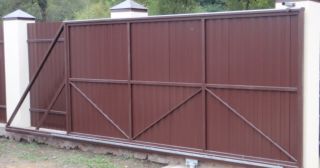 Купить откатные ворота из профнастила Благовещенск, цена от 1790 руб.